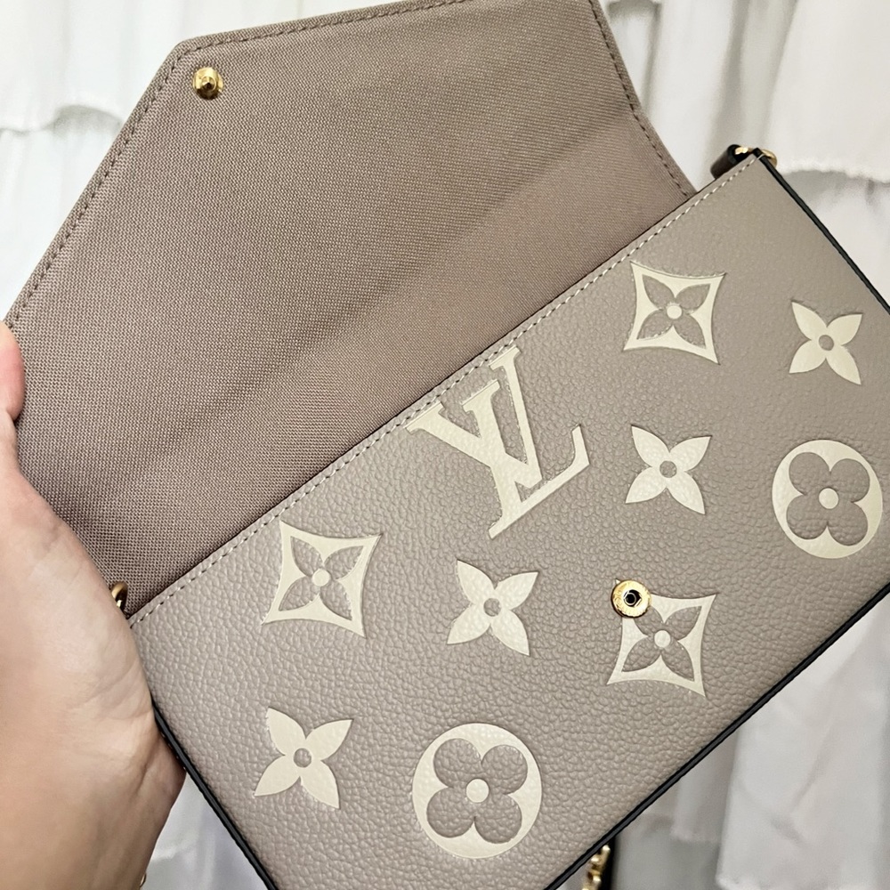 Félicie Pochette in Dove/Cream Monogram Empreinte Authentic Leather.